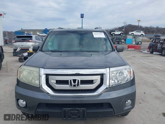2011 Honda Pilot EX-L with VIN 5FNYF4H59BB042308, listed as a IAAI auction lot 41635511 with 196,736 mi miles and . Bid and sale history available at carsss.com. Image 12.