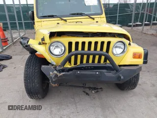 2004 Jeep Wrangler X with VIN 1J4FA39S74P726202, listed as a IAAI auction lot 41613170 with 120,319 mi miles and . Bid and sale history available at DreamBid. Image 17.