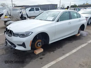 2021 BMW 3 Series 330i z VIN 3MW5R1J08M8C07261, wystawiony jako IAAI lot #41861814 z przebiegiem 87 426 mil mil oraz . Historia ofert i sprzedaży dostępna na DreamBid. Obrazek 17.