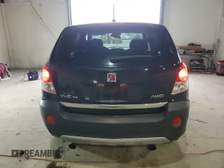 2009 Saturn VUE XE z VIN 3GSDL43N79S609183, wystawiony jako Copart lot #52552385 z przebiegiem 140 404 mil mil oraz Szkody całkowita. Historia ofert i sprzedaży dostępna na DreamBid. Obrazek 6.