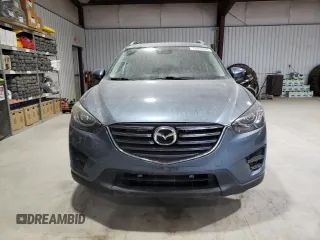2016 Mazda CX-5 Grand Touring with VIN JM3KE4DY1G0714674, listed as a Copart auction lot 75516524 with 115,766 mi miles and Salvage Title. Bid and sale history available at carsss.com. Image 5.