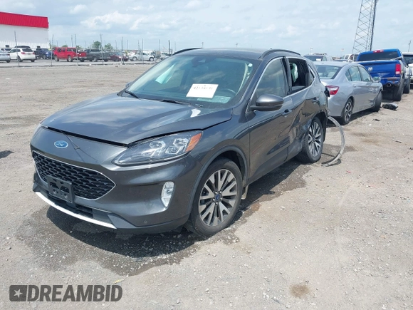 2020 Ford Escape Titanium with VIN 1FMCU9J94LUB19570, listed as a IAAI auction lot 42134031 with 110,248 mi miles and . Bid and sale history available at DreamBid. Image 18.
