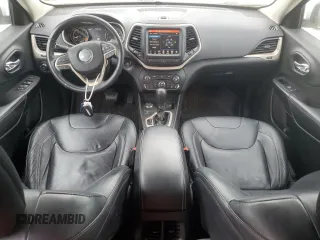 2014 Jeep Cherokee Limited z VIN 1C4PJMDB0EW275953, wystawiony jako Copart lot #53357755 z przebiegiem 114 163 mil mil oraz Szkoda całkowita • Salvage title. Historia ofert i sprzedaży dostępna na DreamBid. Obrazek 8.