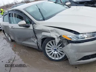 2015 Ford Fusion S Hybrid with VIN 3FA6P0UU4FR111409, listed as a IAAI auction lot 41447316 with 150,068 mi miles. Bid and sale history available at carsss.com. Image 6.