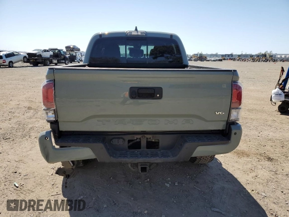 2022 Toyota Tacoma SR z VIN 3TMCZ5AN5NM506941, wystawiony jako Copart lot #52349755 z przebiegiem 46 013 mil mil oraz Szkoda całkowita • Salvage title. Historia ofert i sprzedaży dostępna na DreamBid. Obrazek 6.