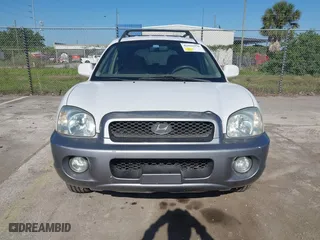 2004 Hyundai Santa Fe GLS with VIN KM8SC73D74U675555, listed as a IAAI auction lot 42021978 with 198,778 mi miles. Bid and sale history available at carsss.com. Image 6.
