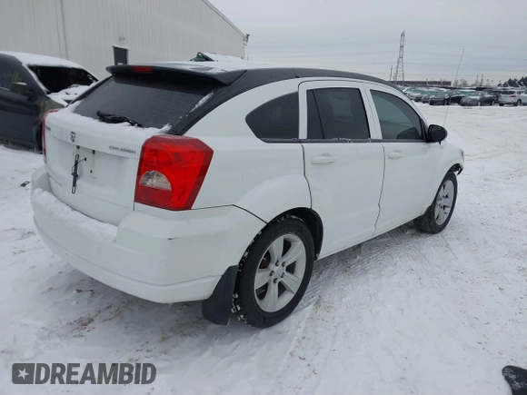 2011 Dodge Caliber Mainstreet with VIN 1B3CB3HAXBD237906, listed as a IAAI auction lot 41589696 with 135,909 mi miles and . Bid and sale history available at DreamBid. Image 4.
