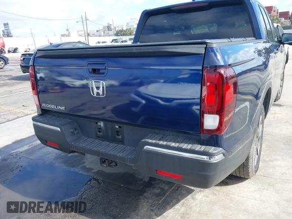 2017 Honda Ridgeline RTL-T with VIN 5FPYK2F68HB001759, listed as a IAAI auction lot 41562343 with 59,633 mi miles and . Bid and sale history available at DreamBid. Image 16.