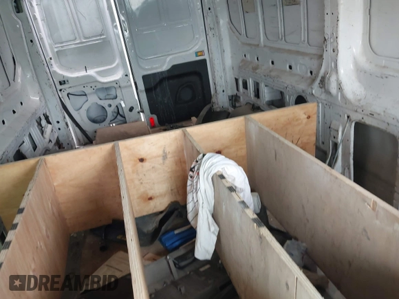 2016 Ford Transit Cargo with VIN 1FTYR2CM2GKA13205, listed as a IAAI auction lot 42697411 with 112,854 mi miles and . Bid and sale history available at DreamBid. Image 8.