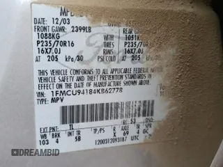 2004 Ford Escape Limited with VIN 1FMCU94184KB62778, listed as a Copart auction lot 70992184 with 165,199 mi miles and Salvage Title. Bid and sale history available at carsss.com. Image 15.