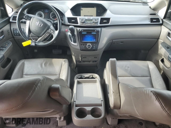 2014 Honda Odyssey Touring z VIN 5FNRL5H94EB006827, wystawiony jako Copart lot #55859715 z przebiegiem 195 131 mil mil oraz Szkoda całkowita • Salvage title. Historia ofert i sprzedaży dostępna na DreamBid. Obrazek 8.