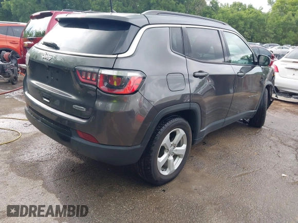 2018 Jeep Compass Latitude with VIN 3C4NJCBB3JT268094, listed as a IAAI auction lot 42487642 with 111,652 mi miles and . Bid and sale history available at DreamBid. Image 4.