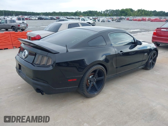 2011 Ford Mustang GT with VIN 1ZVBP8CF5B5150580, listed as a IAAI auction lot 39735125 with 95,737 mi miles. Bid and sale history available at carsss.com. Image 4.