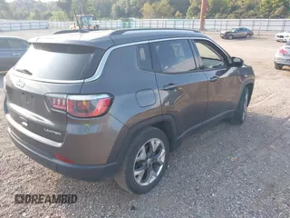 2020 Jeep Compass Limited z VIN 3C4NJCCB7LT170817, wystawiony jako IAAI lot #40180517 z przebiegiem 91 371 mil mil oraz . Historia ofert i sprzedaży dostępna na DreamBid. Obrazek 4.