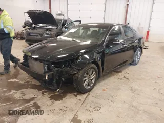 2019 Kia Optima LX with VIN 5XXGT4L31KG376856, listed as a IAAI auction lot 41427583 with 74,339 mi miles. Bid and sale history available at carsss.com. Image 17.