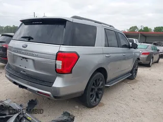 2022 Ford Expedition XLT with VIN 1FMJU1HT0NEA14953, listed as a IAAI auction lot 42053845 with 44,670 mi miles. Bid and sale history available at carsss.com. Image 4.