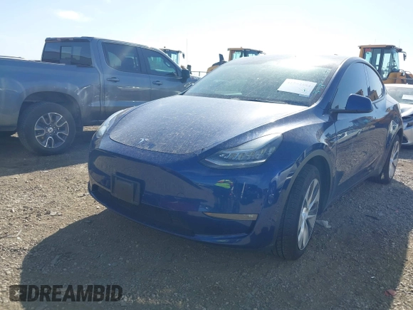 2021 Tesla Model Y Standard Range z VIN 5YJYGDED6MF107711, wystawiony jako IAAI lot #41794384 z przebiegiem 86 934 mil mil oraz . Historia ofert i sprzedaży dostępna na DreamBid. Obrazek 17.