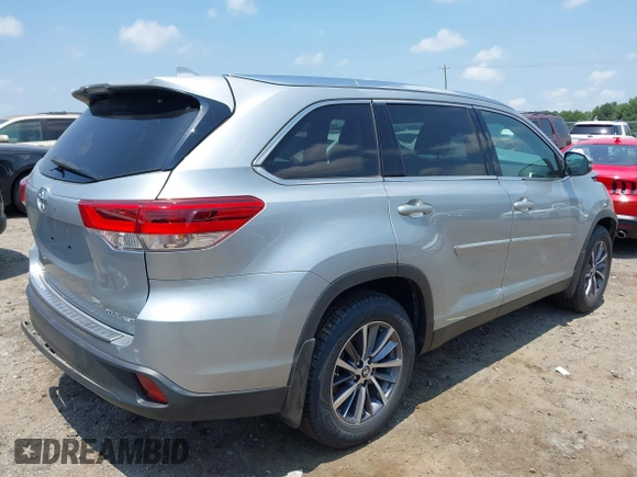 2019 Toyota Highlander SE with VIN 5TDJZRFH6KS614952, listed as a IAAI auction lot 42636713 with 65,471 mi miles and . Bid and sale history available at DreamBid. Image 4.
