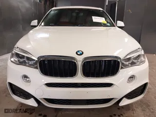 2019 BMW X6 sDrive35i with VIN 5UXKU0C5XK0S97686, listed as a IAAI auction lot 40436492 with 105,584 mi miles. Bid and sale history available at carsss.com. Image 12.