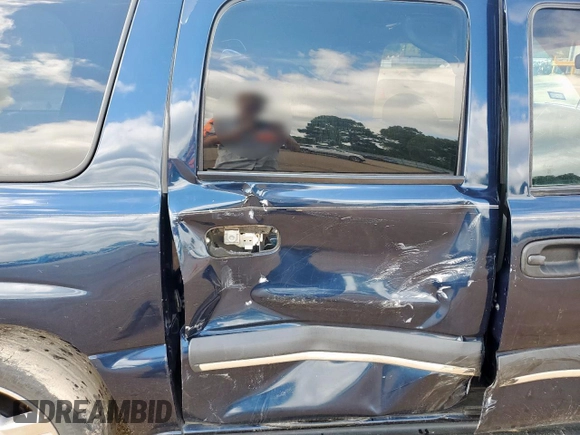 2004 Chevrolet Suburban LS with VIN 3GNEC16Z34G128184, listed as a Copart auction lot 60914515 with Not provided miles and Salvage title. Bid and sale history available at DreamBid. Image 11.