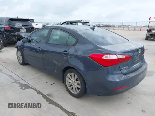 2014 Kia Forte LX with VIN KNAFX4A68E5145665, listed as a IAAI auction lot 42129786 with 192,514 mi miles and . Bid and sale history available at DreamBid. Image 3.