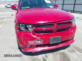 2013 Dodge Durango R/T with VIN 1C4SDJCTXDC697240, listed as a IAAI auction lot 42209558 with 130,735 mi miles and . Bid and sale history available at DreamBid. Image 6.