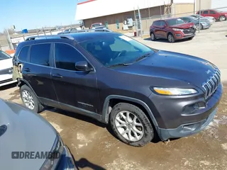 2016 Jeep Cherokee 75th Anniversary with VIN 1C4PJLCB2GW160141, listed as a IAAI auction lot 41748822 with 87,411 mi miles. Bid and sale history available at carsss.com. Image 13.