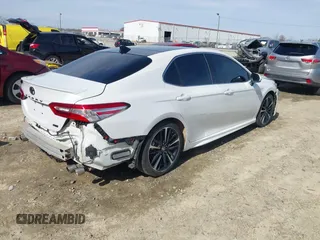 2020 Toyota Camry XSE with VIN 4T1K61AK8LU987937, listed as a IAAI auction lot 41604530 with 102,967 mi miles and . Bid and sale history available at DreamBid. Image 4.