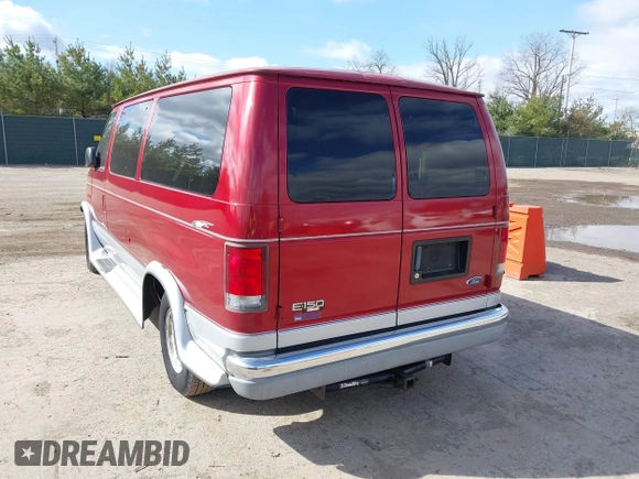 1999 Ford Econoline Passenger XL with VIN 1FMRE11L1XHA05657, listed as a IAAI auction lot 41968923 with 150,868 mi miles and . Bid and sale history available at carsss.com. Image 3.
