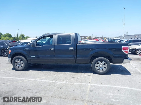 2012 Ford F-150 XL z VIN 1FTFW1CT5CFB34590, wystawiony jako IAAI lot #42279514 z przebiegiem 196 480 mil mil oraz . Historia ofert i sprzedaży dostępna na DreamBid. Obrazek 14.