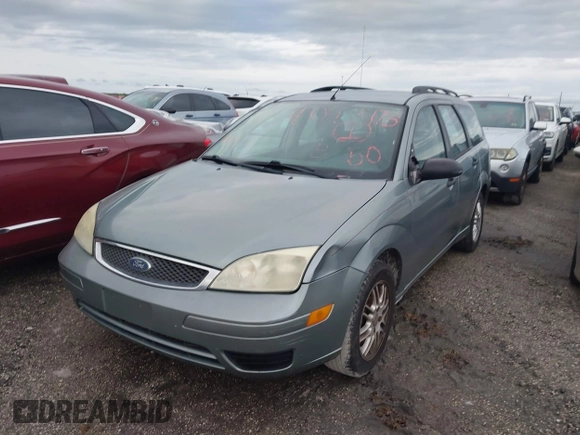 2005 Ford Focus SE with VIN 1FAHP36N65W304897, listed as a IAAI auction lot 40495173 with Not Provided miles and . Bid and sale history available at carsss.com. Image 17.