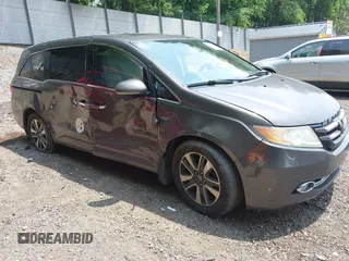 2015 Honda Odyssey Touring Elite with VIN 5FNRL5H93FB106046, listed as a IAAI auction lot 42492096 with 197,575 mi miles and . Bid and sale history available at DreamBid. Image 1.