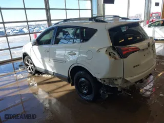 2017 Toyota RAV4 XLE with VIN JTMWFREV0HJ716663, listed as a IAAI auction lot 41256607 with 101,641 mi miles. Bid and sale history available at carsss.com. Image 3.