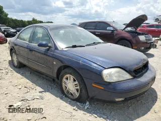 2001 Mercury Sable LS with VIN 1MEHM55SX1G642764, listed as a Copart auction lot 62508394 with 79,074 mi miles and Salvage Title. Bid and sale history available at DreamBid. Image 4.