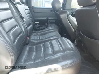 2005 Hummer H2 SUV z VIN 5GRGN23U25H128791, wystawiony jako IAAI lot #42115436 z przebiegiem 286 818 mil mil oraz . Historia ofert i sprzedaży dostępna na DreamBid. Obrazek 8.