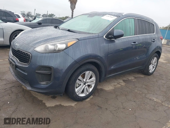 2018 Kia Sportage LX with VIN KNDPM3ACXJ7413596, listed as a IAAI auction lot 41871847 with 72,959 mi miles and . Bid and sale history available at carsss.com. Image 2.