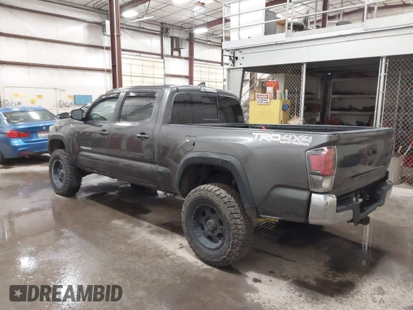 2017 Toyota Tacoma SR5 with VIN 3TMDZ5BN8HM016825, listed as a IAAI auction lot 41658400 with 166,098 mi miles. Bid and sale history available at carsss.com. Image 3.