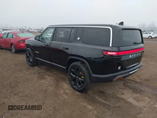 2024 Rivian R1S Adventure with VIN 7PDSGABA1RN035557, listed as a IAAI auction lot 41170478 with 5,210 mi miles. Bid and sale history available at carsss.com. Image 3.