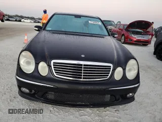 2005 Mercedes-Benz E-Class 5.5L AMG with VIN WDBUF76J05A675937, listed as a Copart auction lot 77349524 with 0 mi miles and Salvage Title. Bid and sale history available at carsss.com. Image 5.