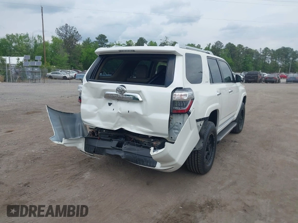 2014 Toyota 4Runner Limited with VIN JTEBU5JR4E5185764, listed as a IAAI auction lot 42117308 with 199,477 mi miles. Bid and sale history available at carsss.com. Image 4.