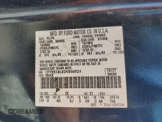 2002 Ford F-150 XL with VIN 1FTRX18L82NB06824, listed as a Copart auction lot 57342315 with 207,390 mi miles and Salvage title. Bid and sale history available at DreamBid. Image 12.