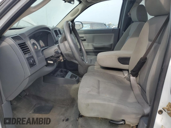 2006 Dodge Dakota ST with VIN 1D7HE22K96S611677, listed as a Copart auction lot 68558354 with 157,305 mi miles and Salvage Title. Bid and sale history available at DreamBid. Image 7.
