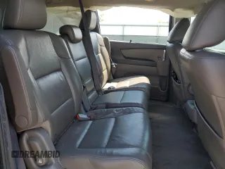 2014 Honda Odyssey Touring with VIN 5FNRL5H93EB061754, listed as a Copart auction lot 55182015 with 168,058 mi miles and Salvage title. Bid and sale history available at DreamBid. Image 11.