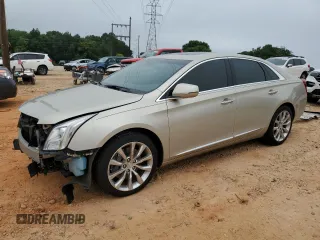 2016 Cadillac XTS Luxury Collection with VIN 2G61N5S39G9114415, listed as a Copart auction lot 58657525 with 104,218 mi miles and Salvage title. Bid and sale history available at DreamBid. Image 1.