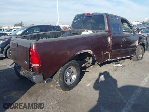 2000 Ford F-150 XL with VIN 1FTRX17L2YNB78032, listed as a IAAI auction lot 41687215 with 1 mi miles. Bid and sale history available at carsss.com. Image 4.