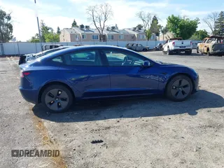 2023 Tesla Model 3 Long Range with VIN 5YJ3E1EB0PF620745, listed as a IAAI auction lot 42010603 with 39,846 mi miles and . Bid and sale history available at DreamBid. Image 14.
