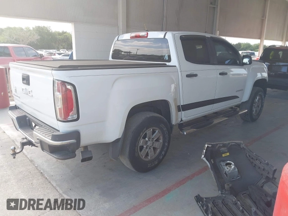 2015 GMC Canyon 2WD z VIN 1GTG5AEA8F1256722, wystawiony jako IAAI lot #42159367 z przebiegiem 140 963 mil mil oraz . Historia ofert i sprzedaży dostępna na DreamBid. Obrazek 4.