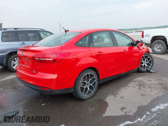 2017 Ford Focus SE with VIN 1FADP3FE9HL222795, listed as a IAAI auction lot 42425996 with 90,724 mi miles and . Bid and sale history available at DreamBid. Image 4.