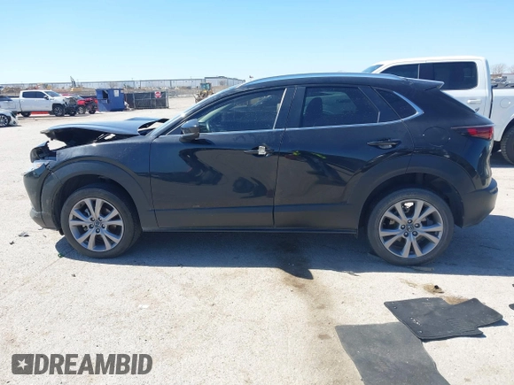 2022 Mazda CX-30 S Select z VIN 3MVDMBBL7NM413447, wystawiony jako IAAI lot #41772804 z przebiegiem 69 102 mil mil oraz . Historia ofert i sprzedaży dostępna na DreamBid. Obrazek 14.