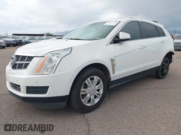 2012 Cadillac SRX Luxury Collection z VIN 3GYFNAE32CS518428, wystawiony jako IAAI lot #42153391 z przebiegiem 159 836 mil mil oraz . Historia ofert i sprzedaży dostępna na DreamBid. Obrazek 2.